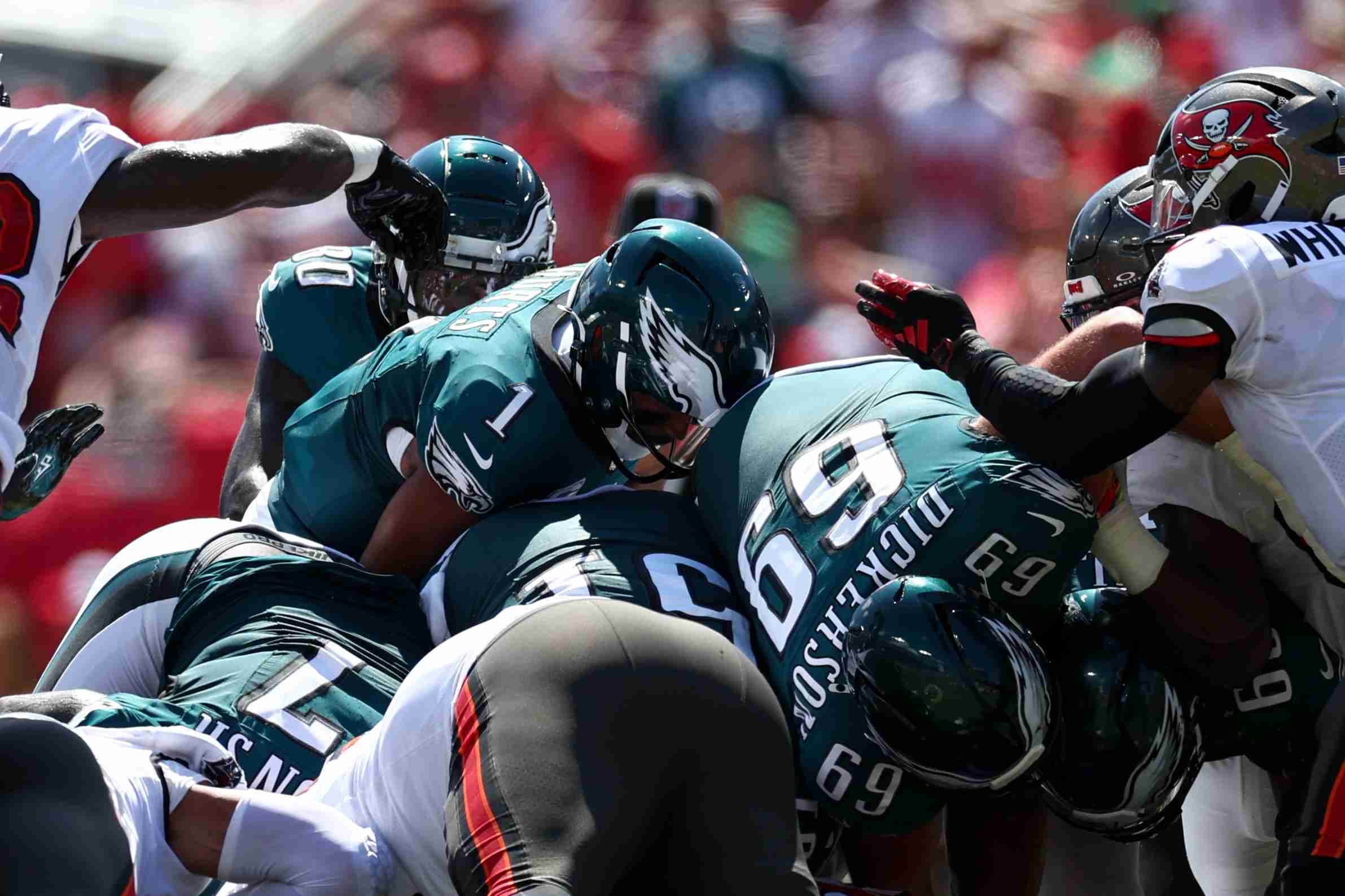 Sep 29, 2024; Tampa, Florida, USA; Philadelphia Eagles quarterback Jalen Hurts (1) runs with the ball against the Tampa Bay Buccaneers in the second quarter at Raymond James Stadium. Mandatory Credit: Nathan Ray Seebeck-Imagn Images